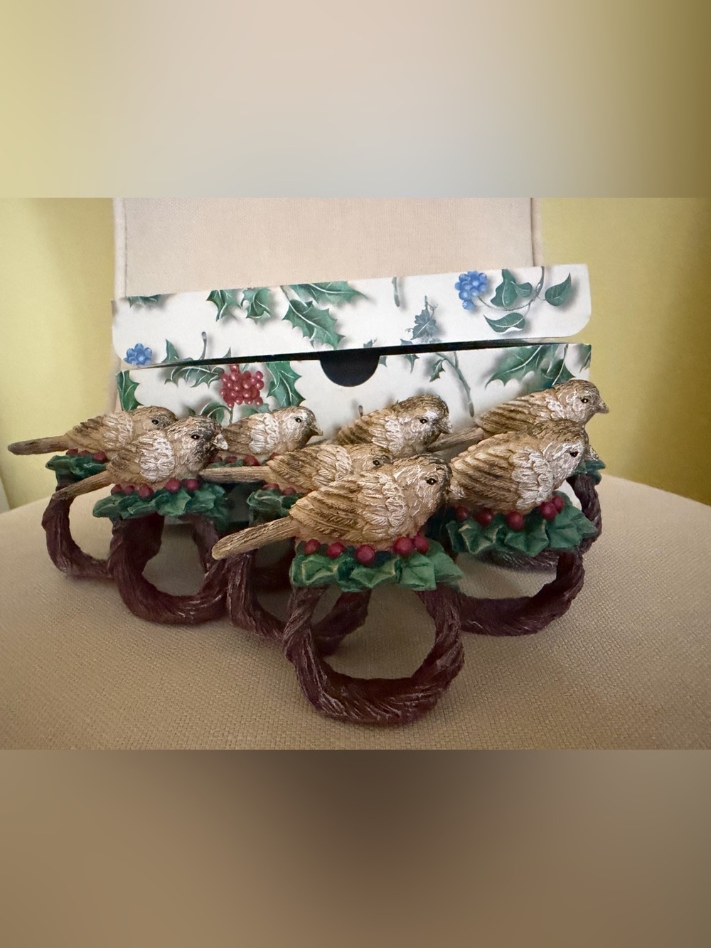 Decorative Brown Bird Napkin Rings with Green Holly Accents